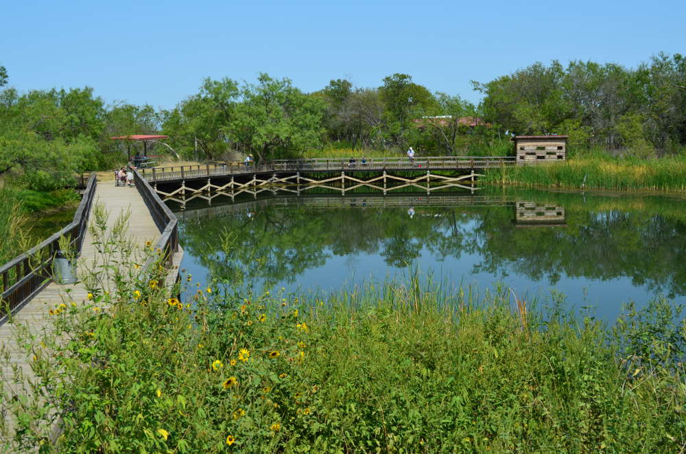 Joe Pool Lake with lush greens and bridge in Dallas Forth Worth area